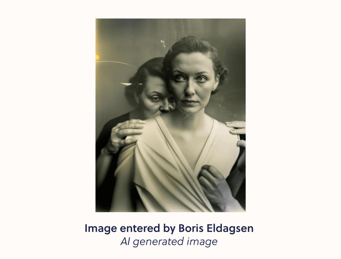 Picture of the image entered by Boris Eldagsen. An image of a lady sniffing the sholder of a younger women in front of her.