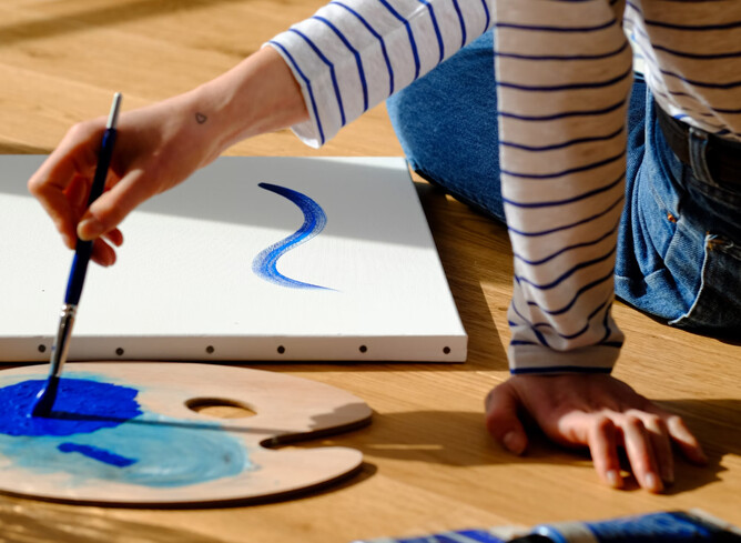 Photo showing someone painting